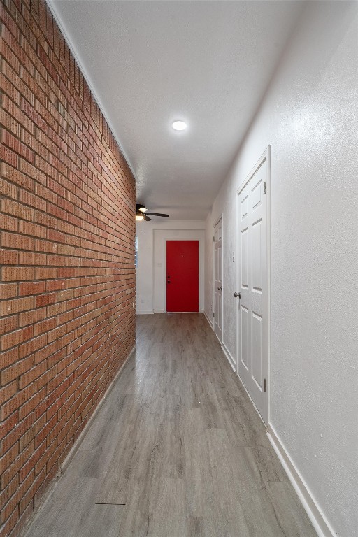 10205 Old Manchaca Road, Unit B Austin, TX 78748 - Photo 3 of 24 a view of hallway with wooden floor
