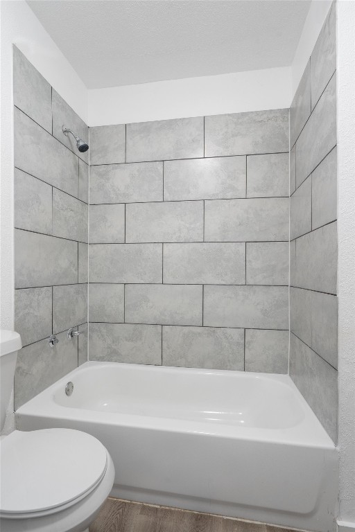 10205 Old Manchaca Road, Unit B Austin, TX 78748 - Photo 8 of 24 a bathroom with a bathtub and shower