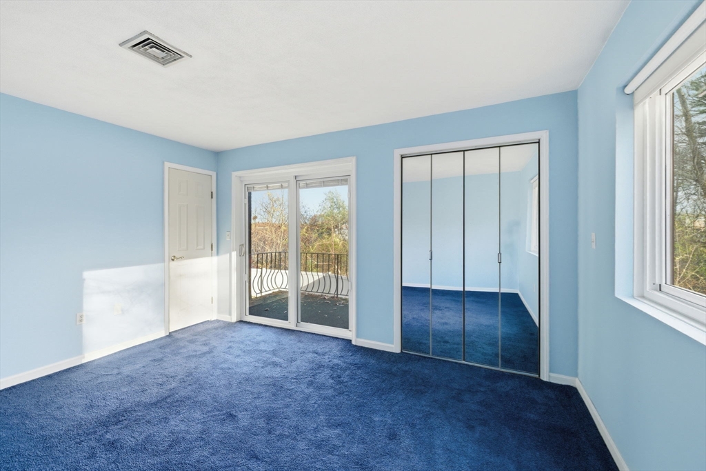 9 Thomas Street, Unit C11 Saugus, MA 01906 - Photo 15 of 42 a view of an empty room with a window