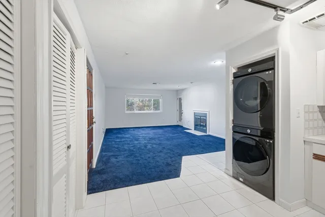 a view of a livingroom with a flat screen tv