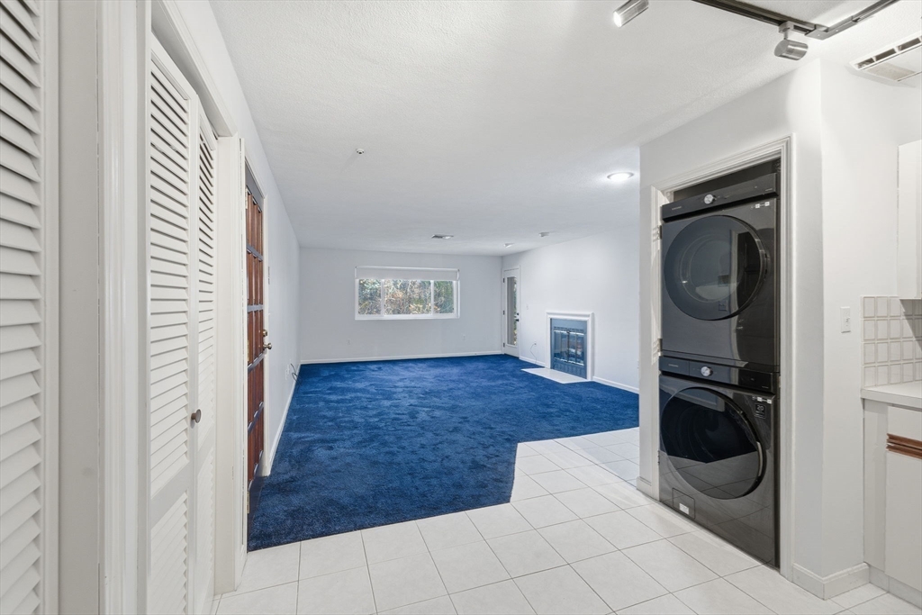 9 Thomas Street, Unit C11 Saugus, MA 01906 - Photo 9 of 42 a view of a livingroom with a flat screen tv