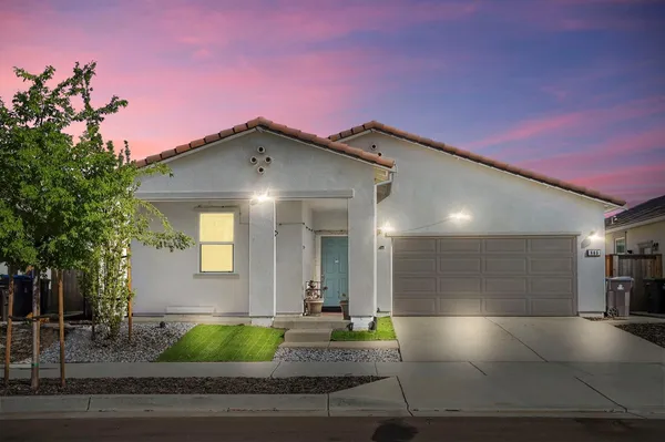 a view of a house with a street
