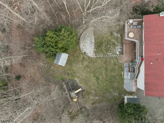 view of a bathroom with a shower and a sink