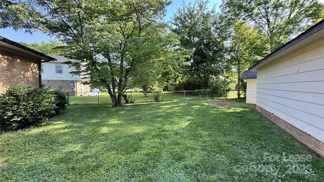 a house view with a garden space