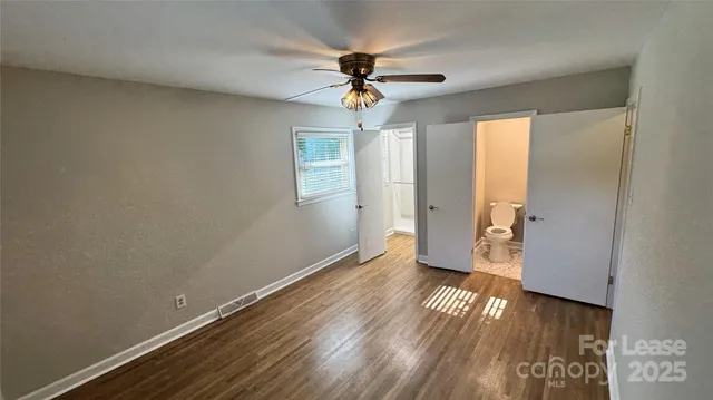a view of a bathroom with a sink and a mirror