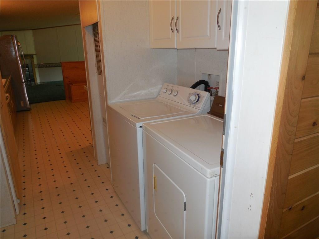211 Brett Hill Road South Paris, ME 04281 - Photo 23 of 35 Laundry off the kitchen area.