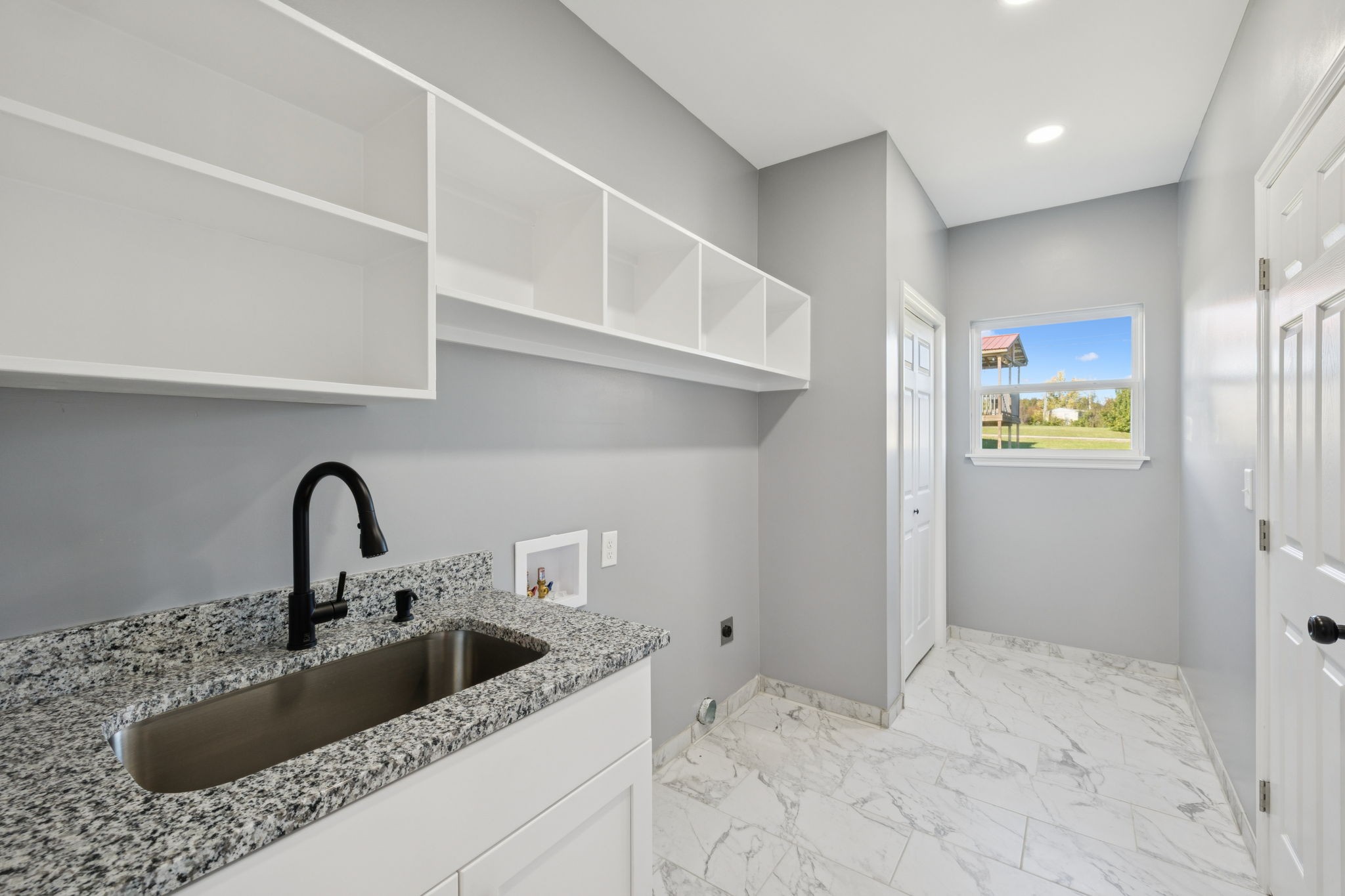 10154 Rocky Point Road Bon Aqua, TN 37025 - Photo 20 of 26 a close view of a sink and tap