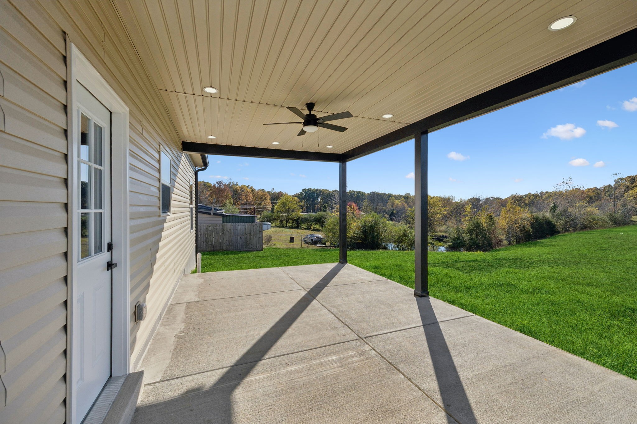 10154 Rocky Point Road Bon Aqua, TN 37025 - Photo 21 of 26 a view of a porch and garden