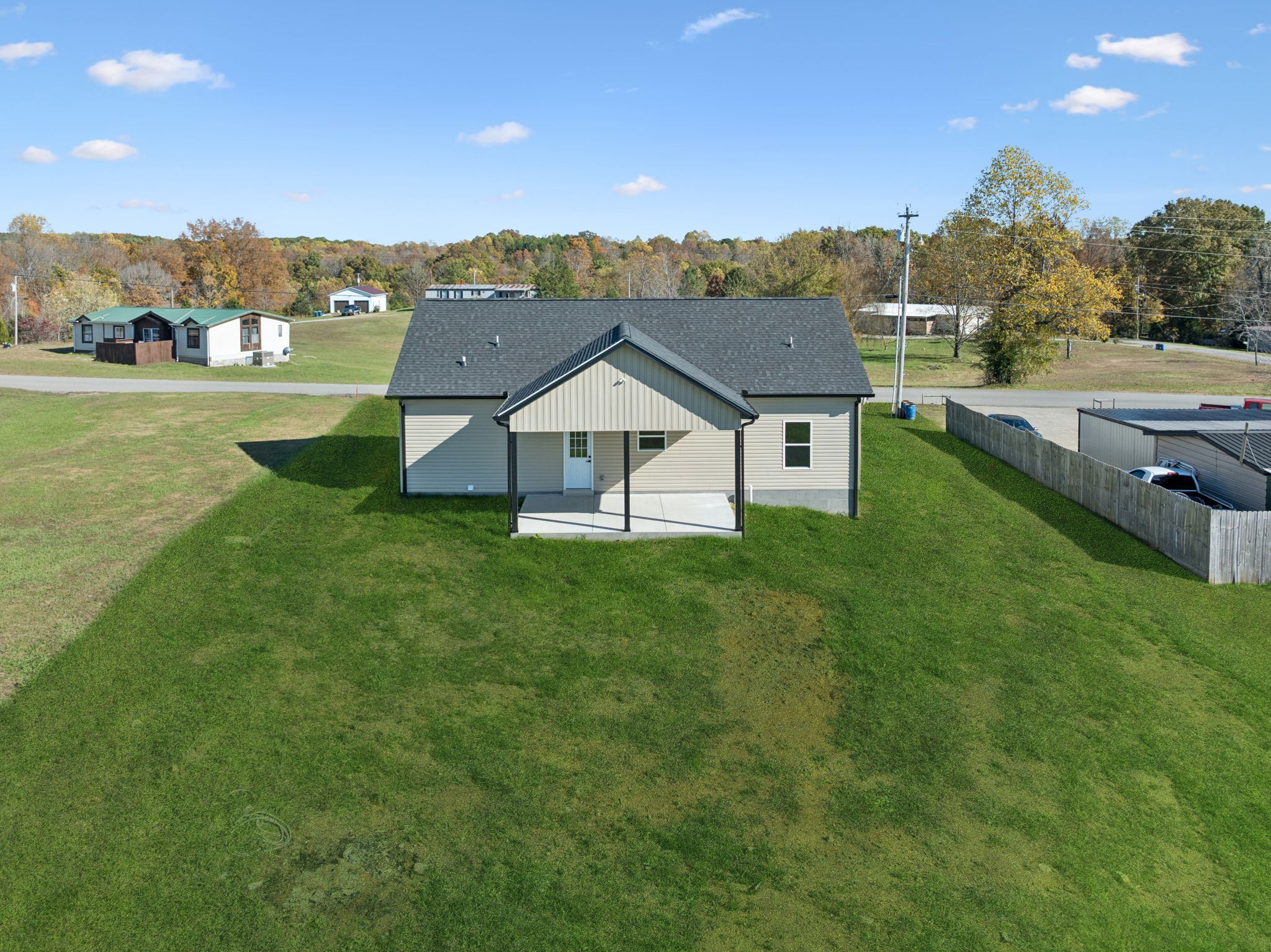10154 Rocky Point Road Bon Aqua, TN 37025 - Photo 25 of 26 a view of a house with a big yard