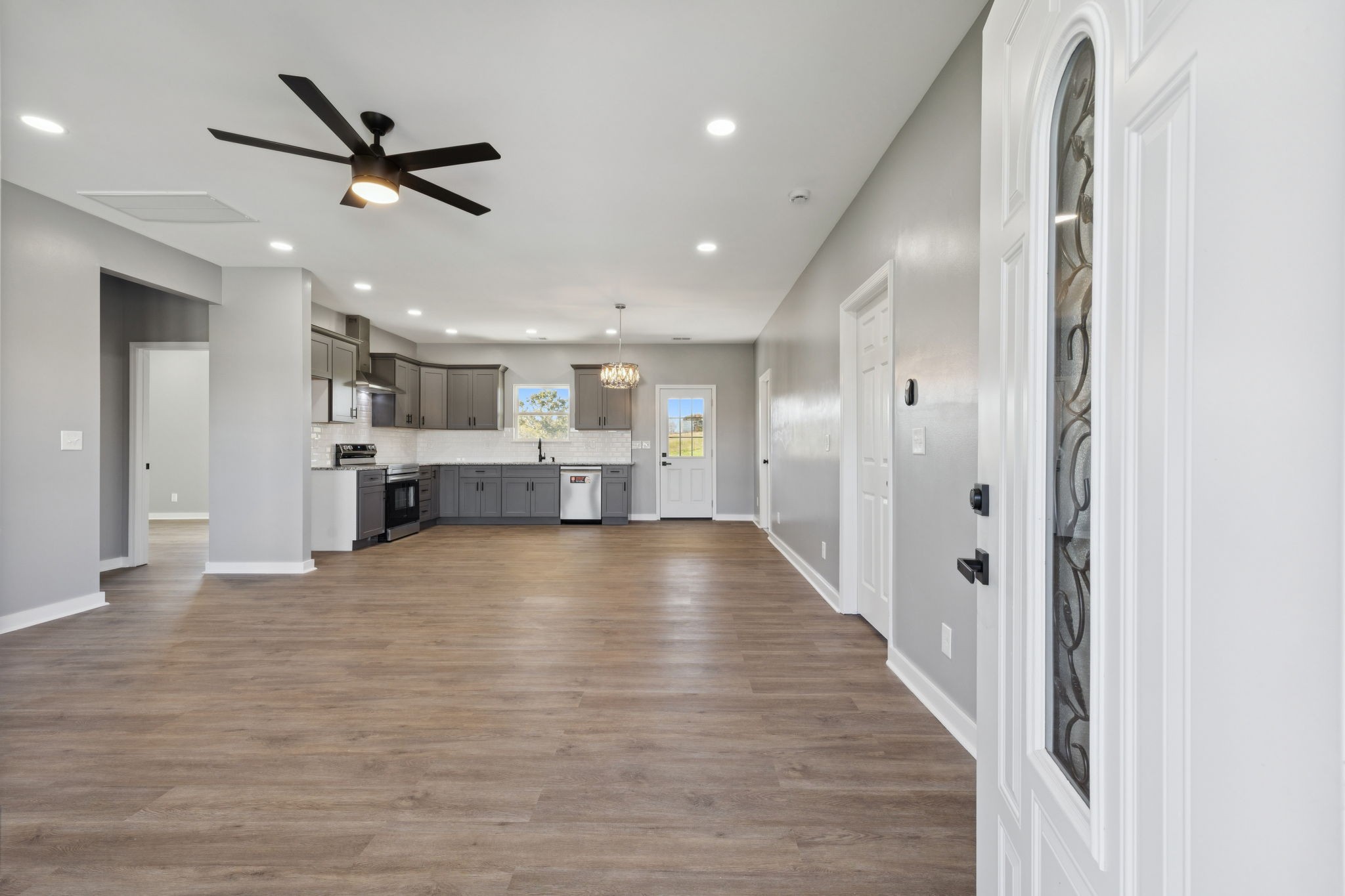10154 Rocky Point Road Bon Aqua, TN 37025 - Photo 5 of 26 a view of an empty room and kitchen view