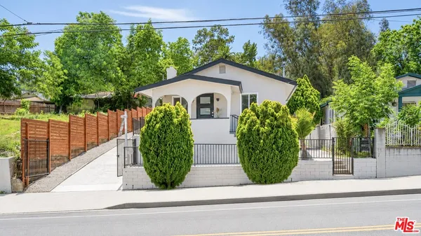 a view of outdoor space and yard