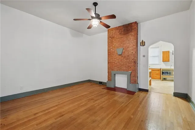 a kitchen with stainless steel appliances granite countertop a stove and a refrigerator