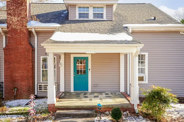 a bathroom with a sink a mirror and a light fixture