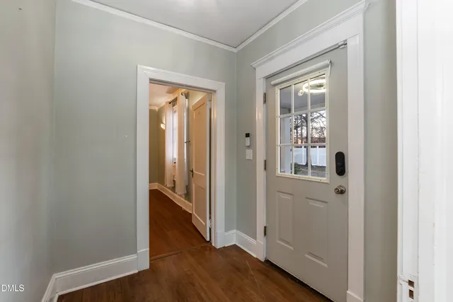 a bathroom with a mirror and a sink