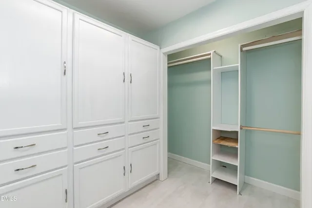 a bathroom with a sink and a bathtub with shower