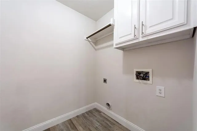 a view of a door and a window