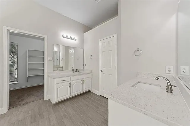 a bathroom with a sink and a bathtub