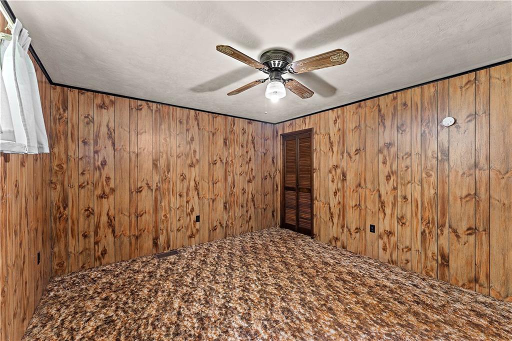 104 W Road Pittsburgh, PA 15209 - Photo 17 of 40 a view of a hallway with wooden floor and chandelier