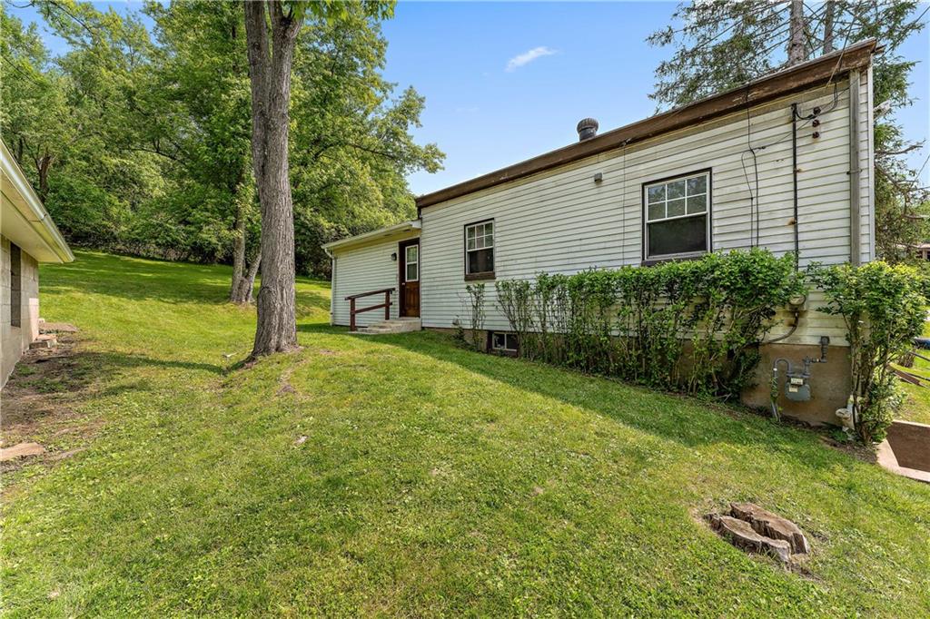 104 W Road Pittsburgh, PA 15209 - Photo 39 of 40 a view of a backyard with plants and large tree