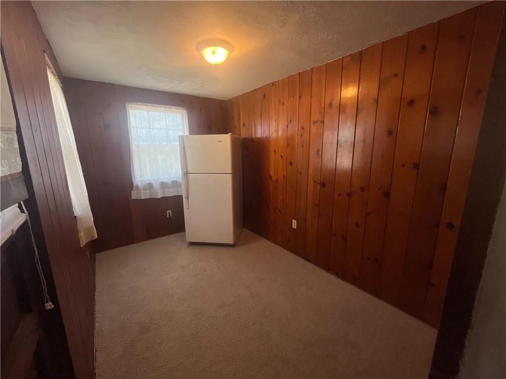 104 W Road Pittsburgh, PA 15209 - Photo 4 of 40 a view of an empty room with a fireplace
