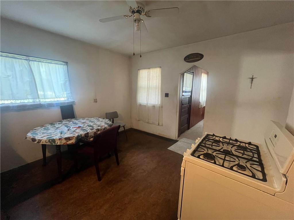 104 W Road Pittsburgh, PA 15209 - Photo 8 of 40 a bedroom with a bed and a chandelier