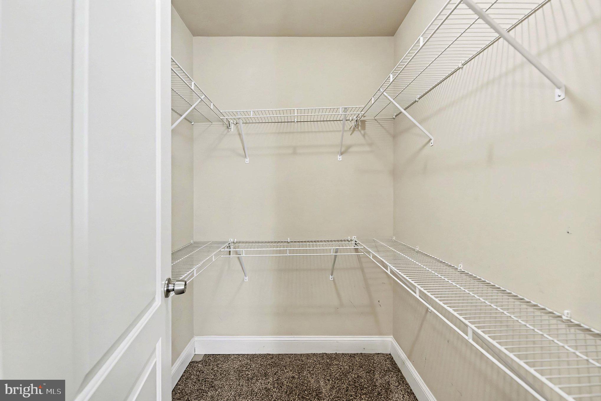 8716 Eddington Road Parkville, MD 21234 - Photo 24 of 27 a view of a room with racks on the wall