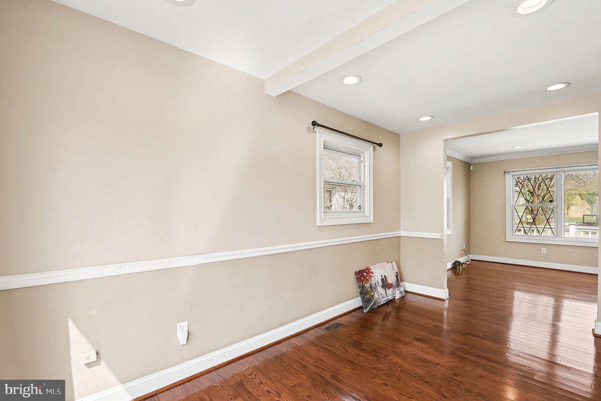 8716 Eddington Road Parkville, MD 21234 - Photo 25 of 27 a view of livingroom with furniture and wooden floor