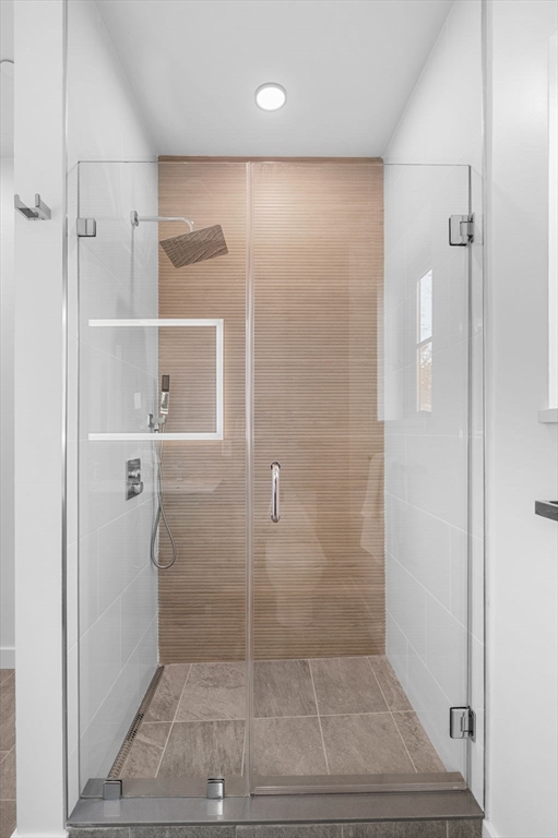 11 Boynton Street, Unit 101 Swampscott, MA 01907 - Photo 30 of 42 a bathroom with a shower