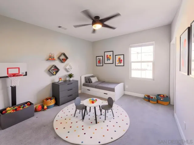 a living room with furniture and decor