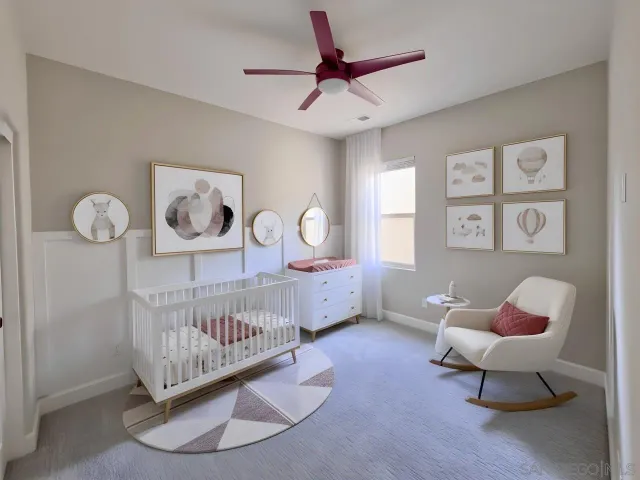 a bed room with furniture and a window