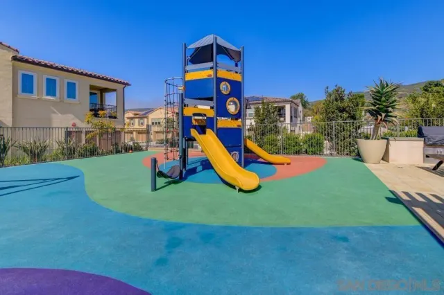 a view of a house with a yard porch and sitting area