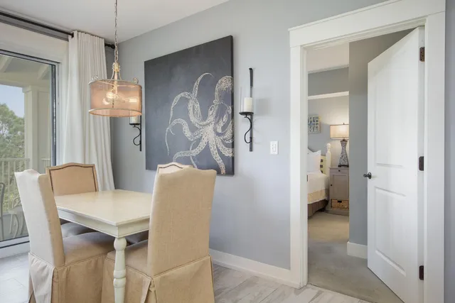 a living room with furniture and a mirror