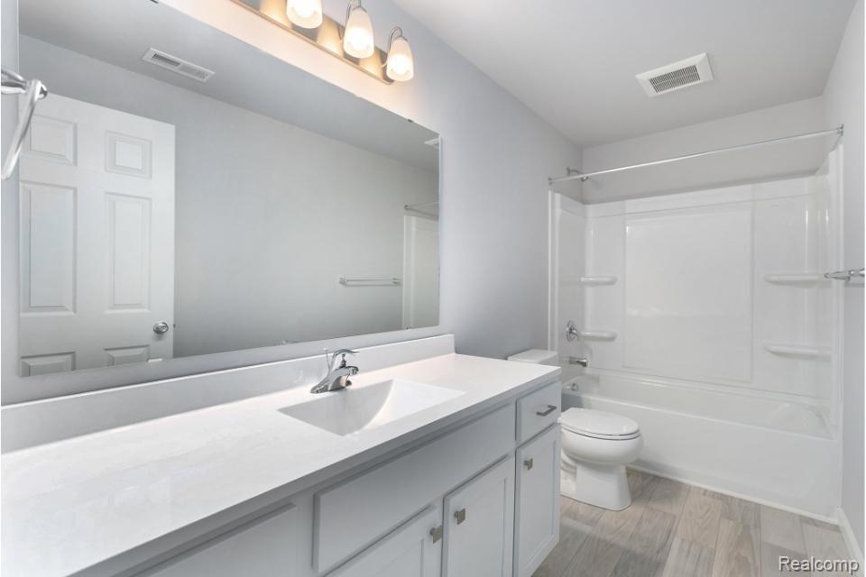 250 Joy Road Adrian, MI 49221 - Photo 13 of 32 Primary suite has large private bath and WIC