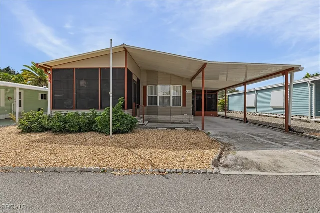 a view of a house with a street