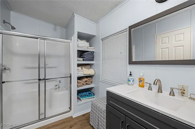 a kitchen with stainless steel appliances and cabinets