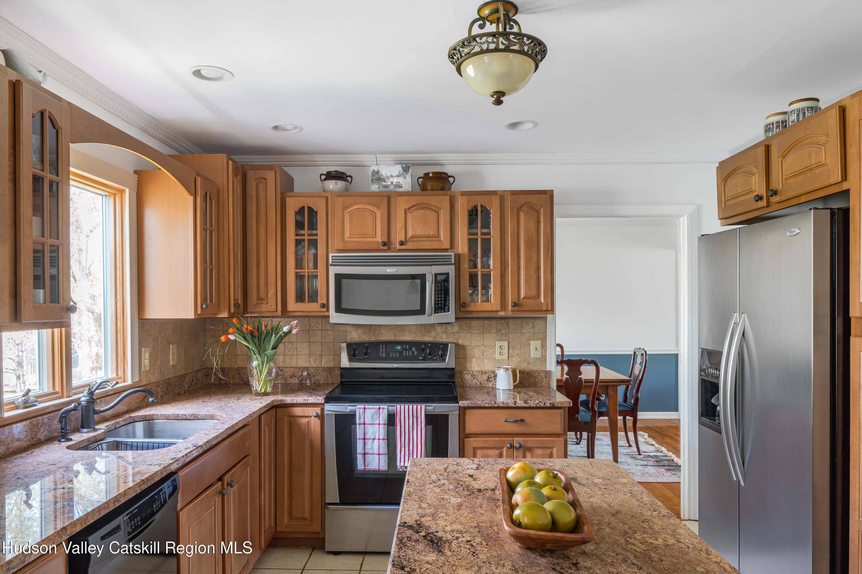 1 Stone Ridge Court Woodstock, NY 12498 - Photo 11 of 30 a kitchen with stainless steel appliances granite countertop a refrigerator a stove top oven a sink and dishwasher