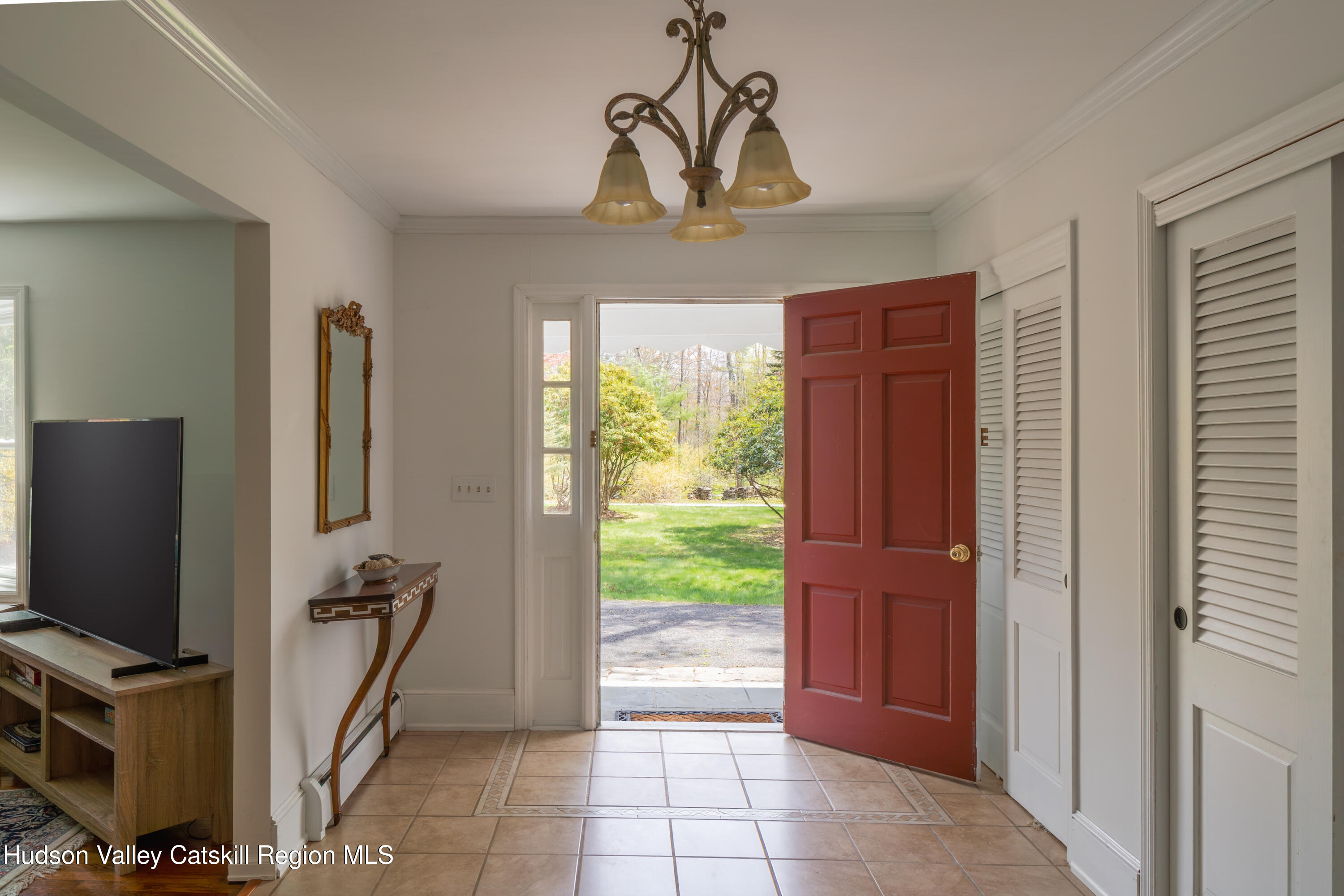 1 Stone Ridge Court Woodstock, NY 12498 - Photo 14 of 30 a view of a hallway to a livingroom with furniture