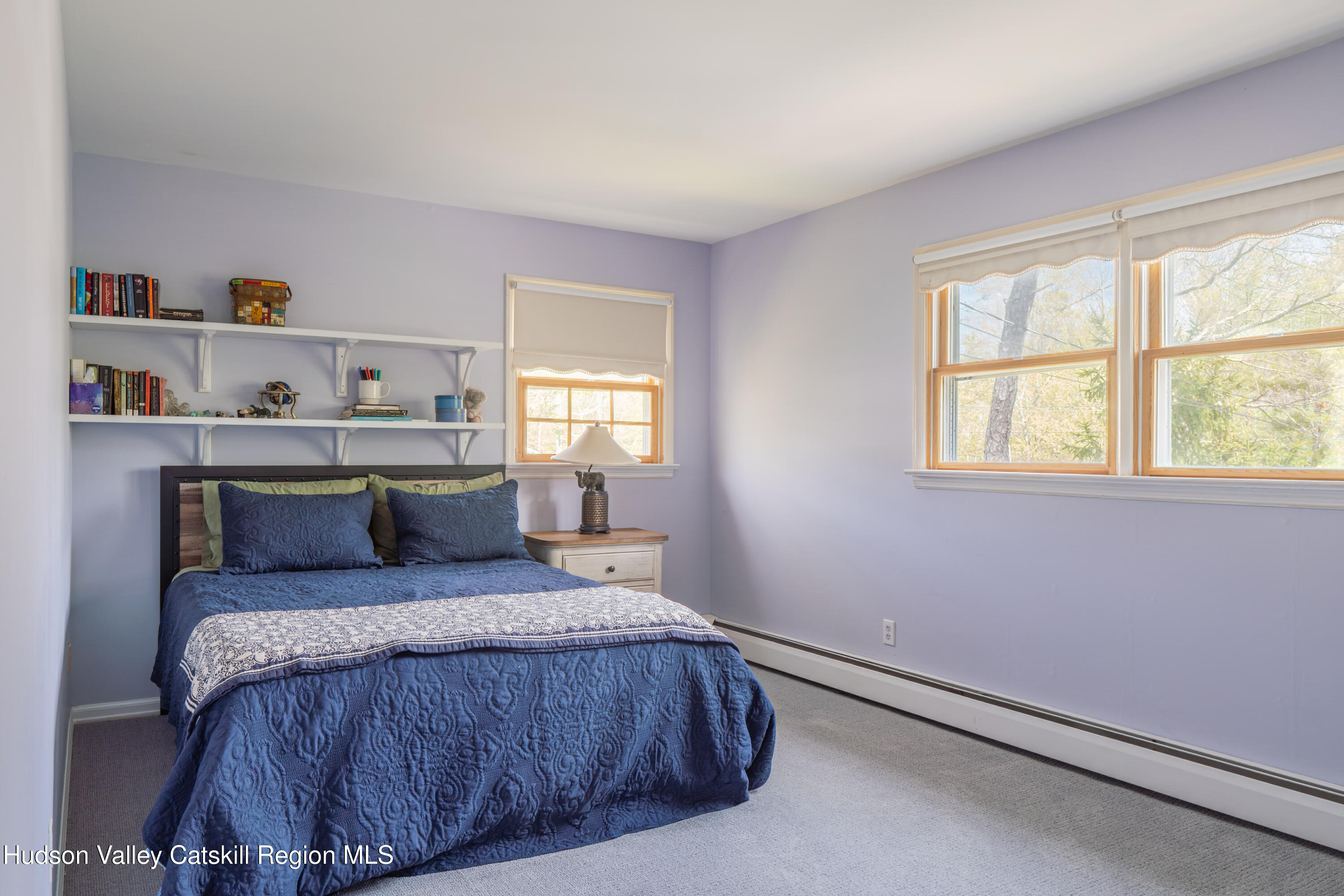1 Stone Ridge Court Woodstock, NY 12498 - Photo 18 of 30 a bedroom with a bed and a window