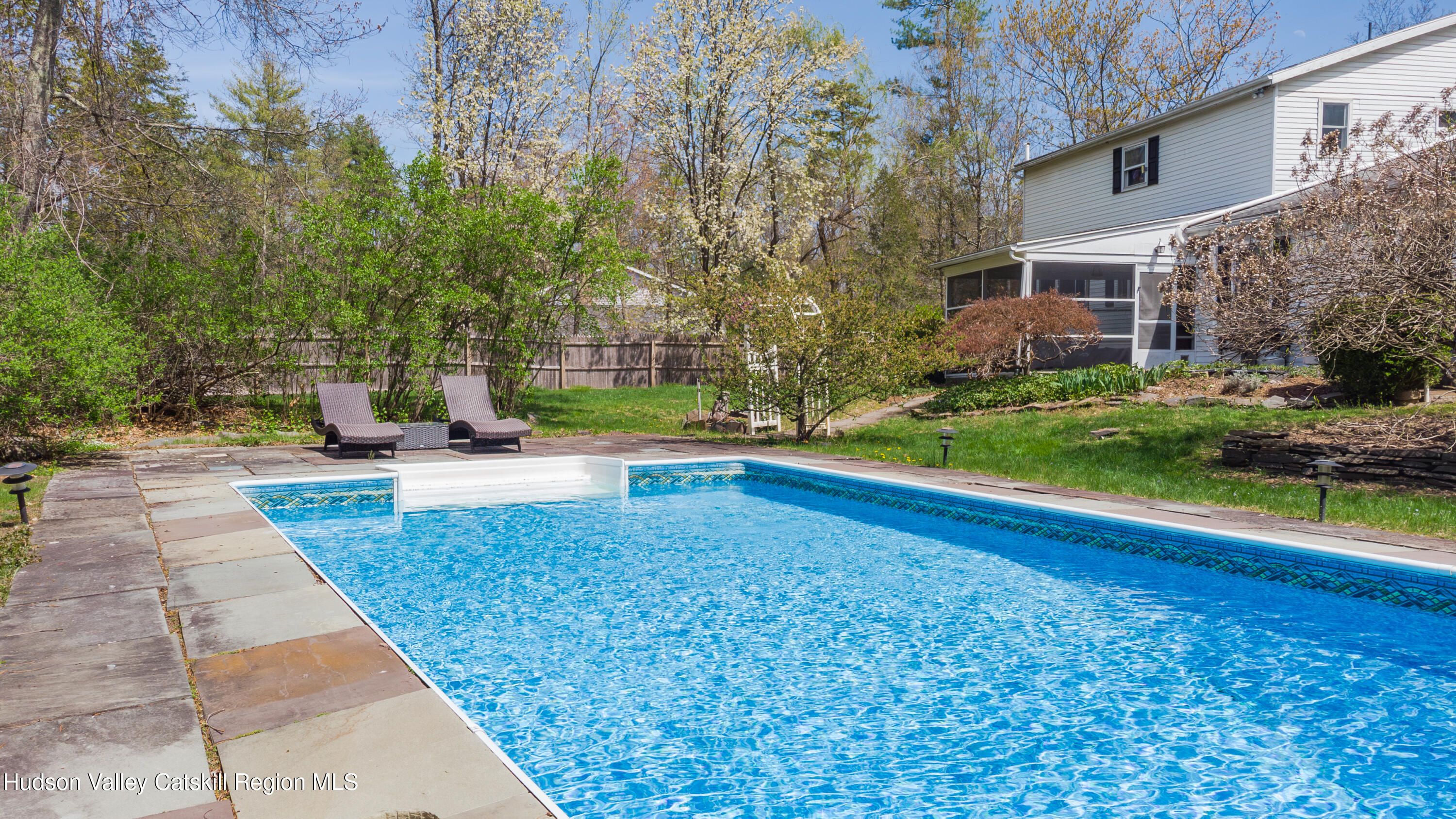 1 Stone Ridge Court Woodstock, NY 12498 - Photo 2 of 30 a view of a yard with palm trees