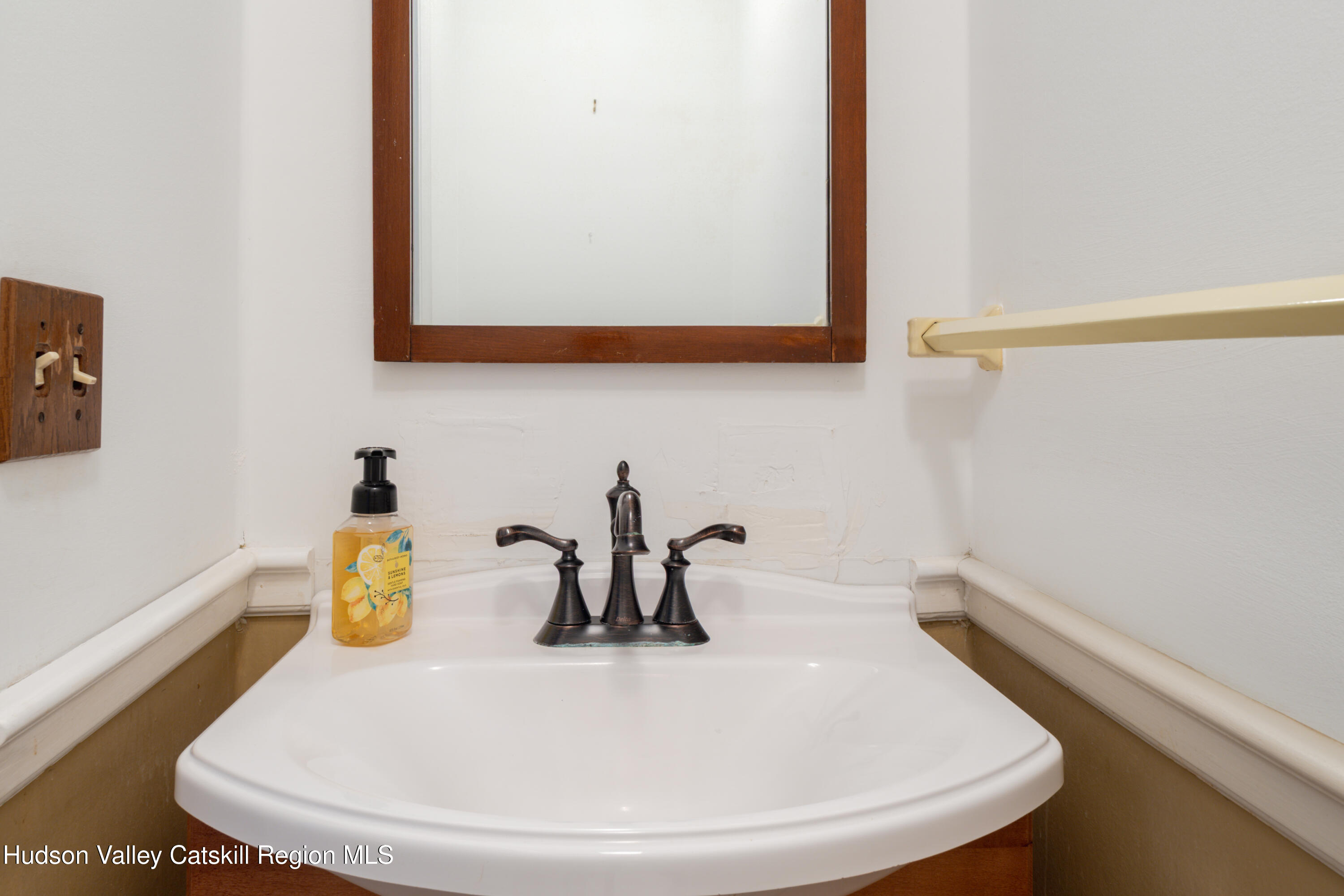 1 Stone Ridge Court Woodstock, NY 12498 - Photo 24 of 30 a bathroom with a sink and a mirror