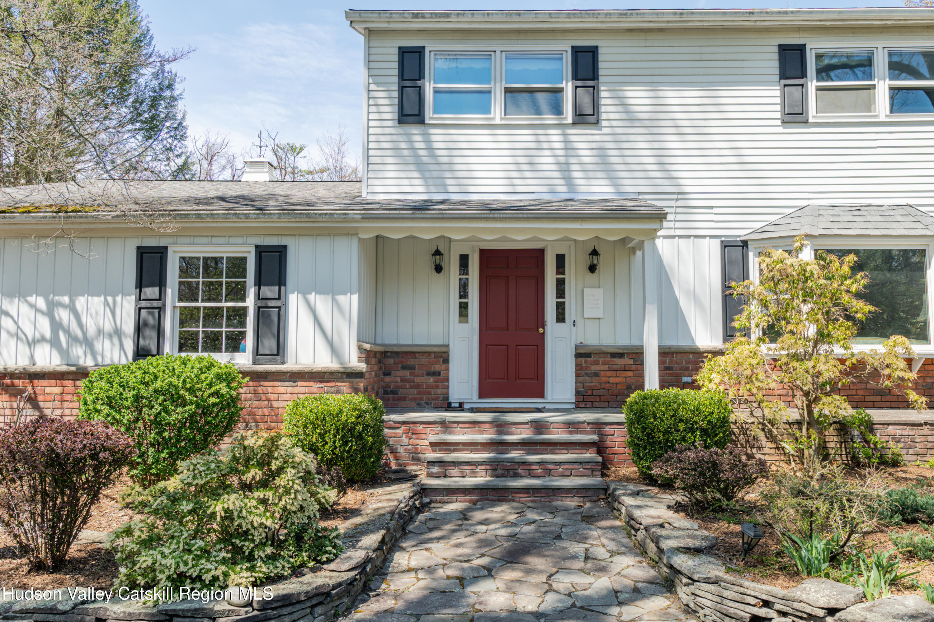 1 Stone Ridge Court Woodstock, NY 12498 - Photo 25 of 30 a front view of a house with garden