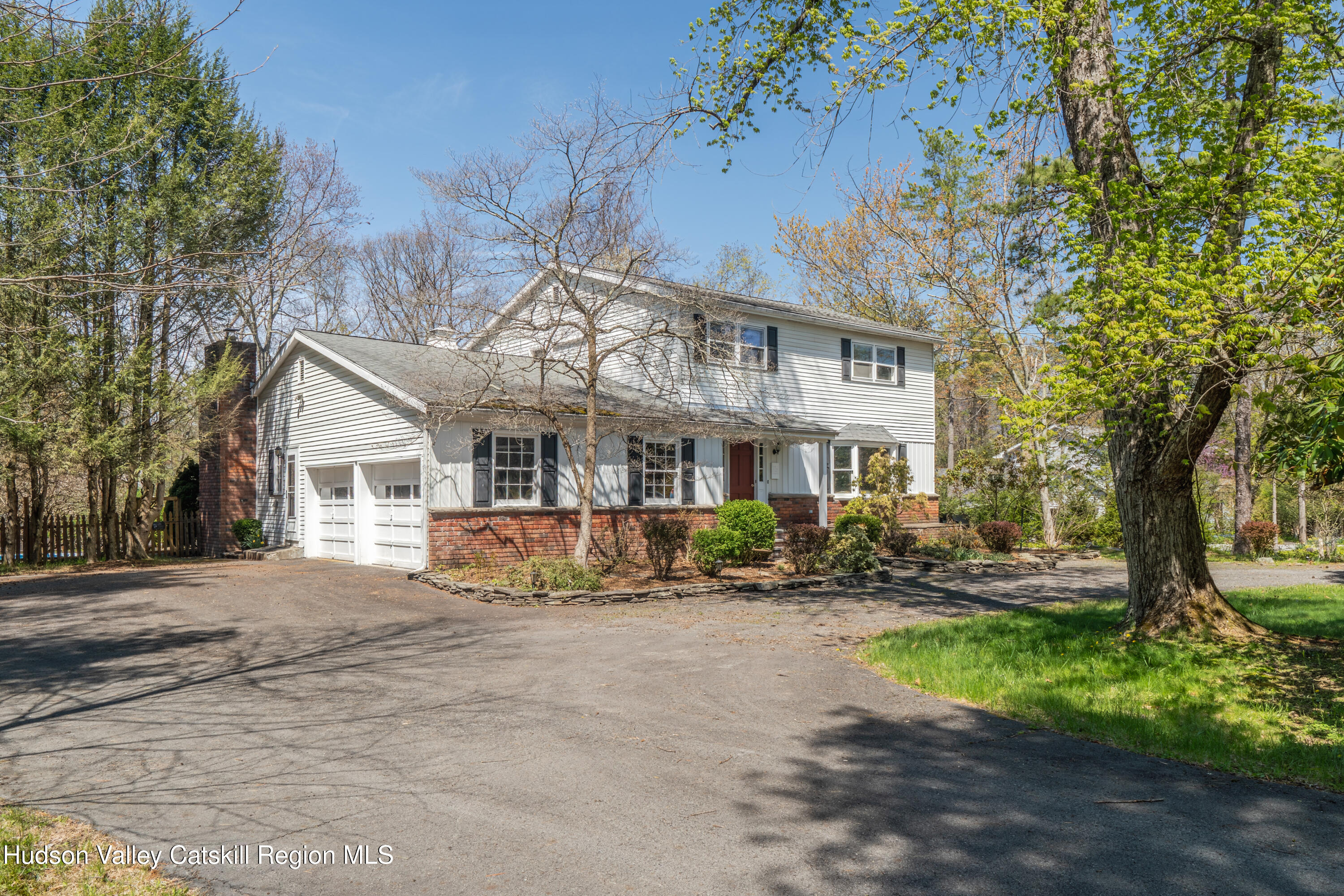 1 Stone Ridge Court Woodstock, NY 12498 - Photo 26 of 30 a front view of a house with a yard