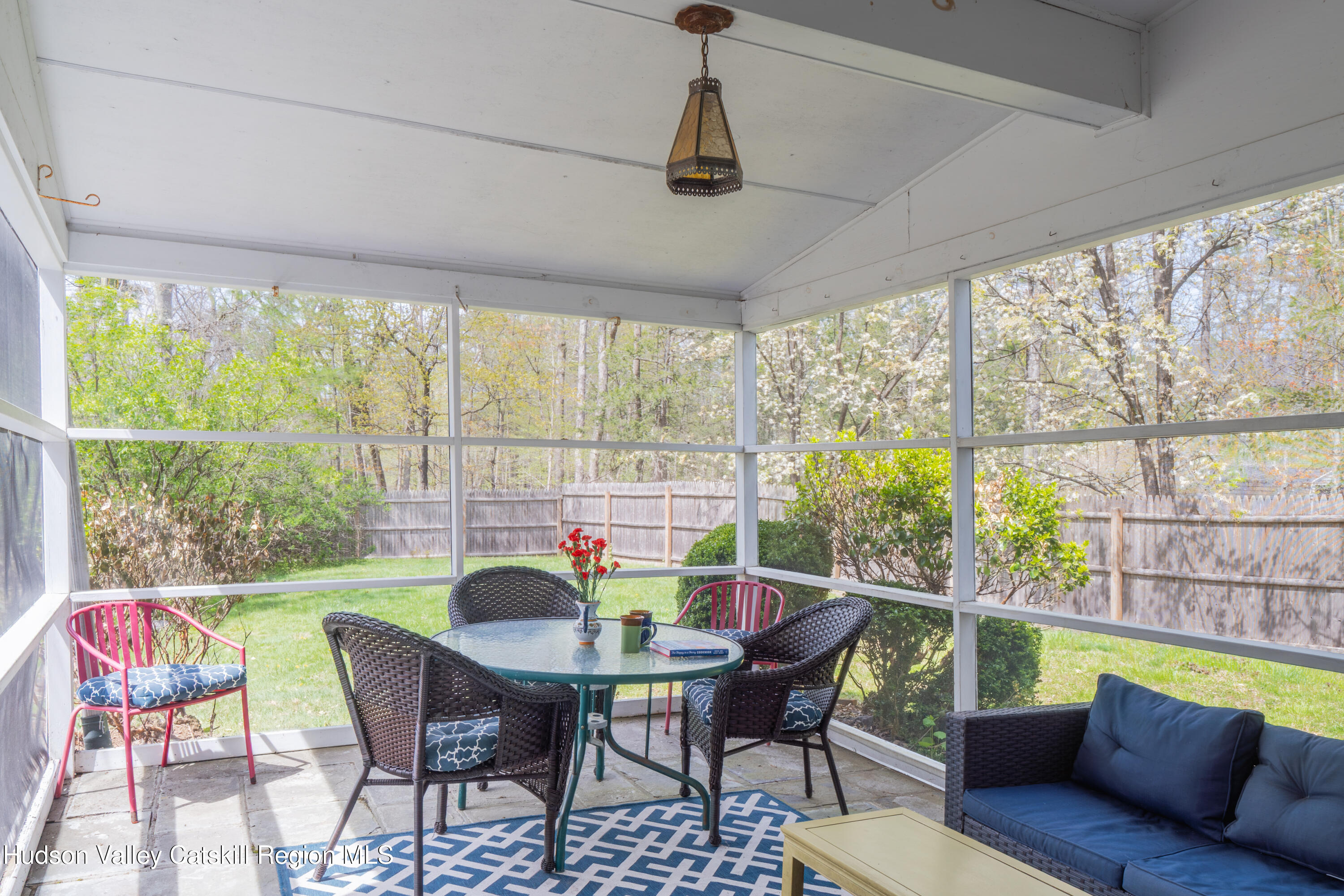 1 Stone Ridge Court Woodstock, NY 12498 - Photo 4 of 30 a view of a dining room with furniture window and outside view