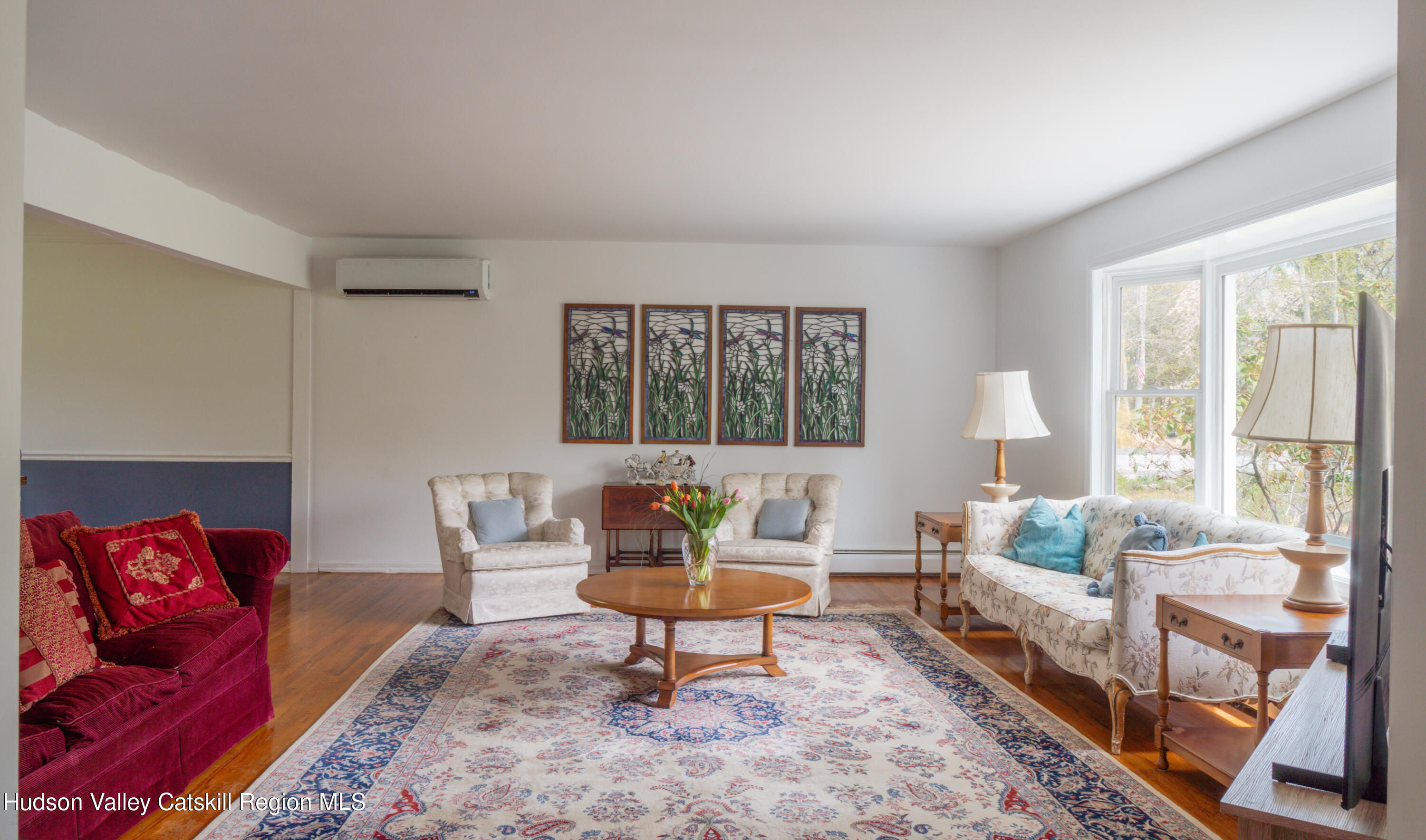 1 Stone Ridge Court Woodstock, NY 12498 - Photo 6 of 30 a living room with furniture and a large window