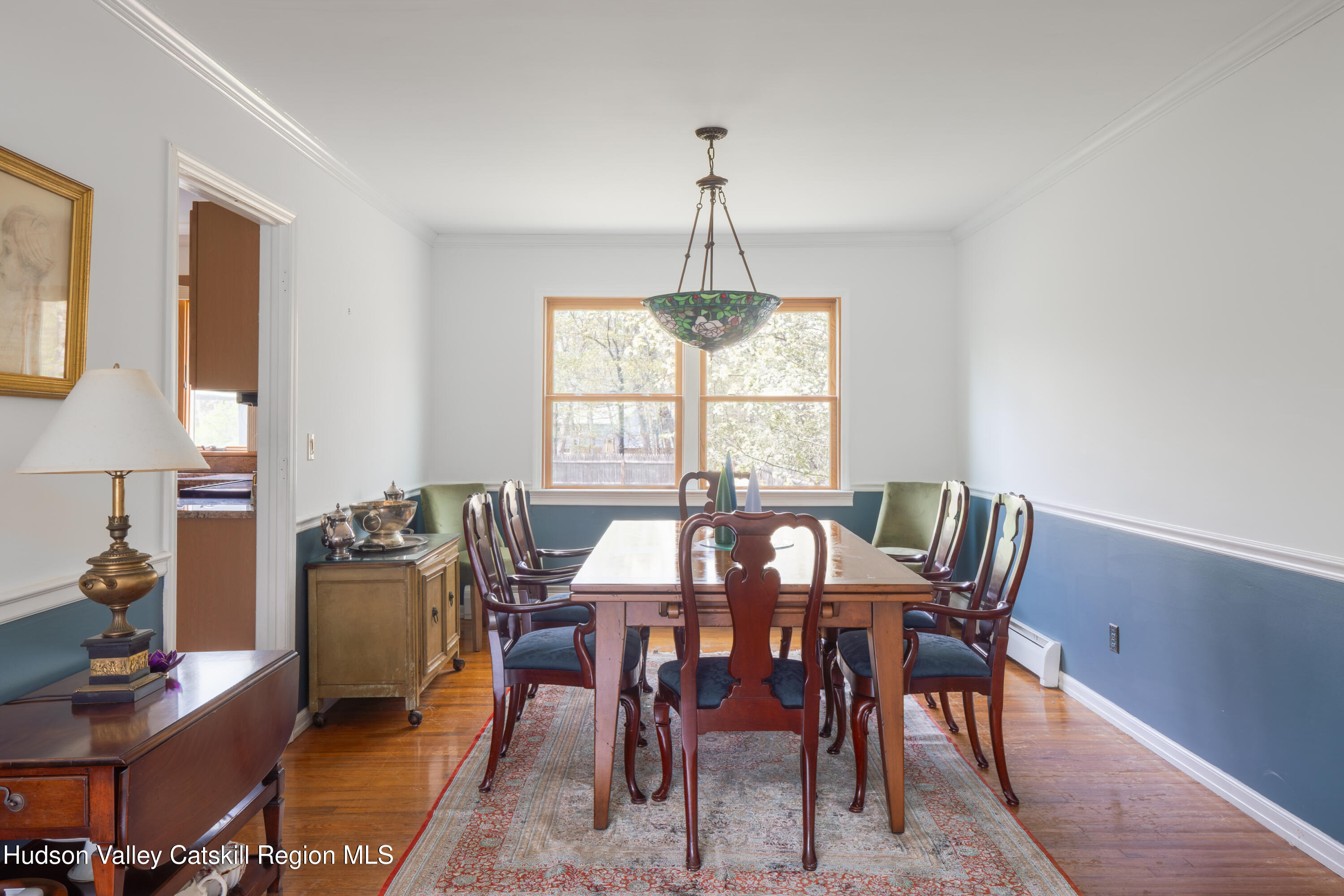 1 Stone Ridge Court Woodstock, NY 12498 - Photo 8 of 30 a view of a dining room with furniture window and outside view