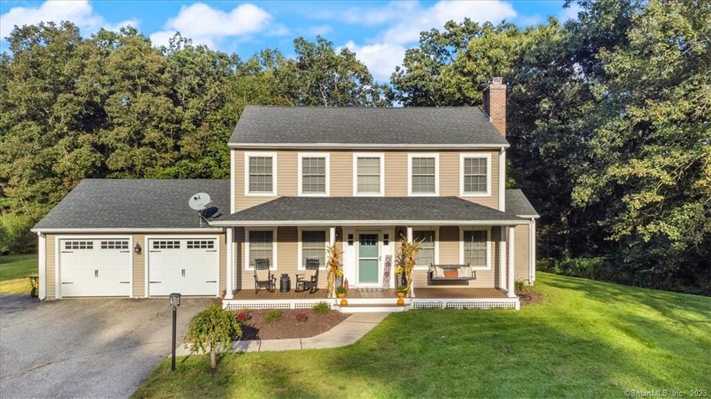 8 Stony Ridge Road Windham, CT 06256 - Photo 1 of 1 front view of a house with a yard