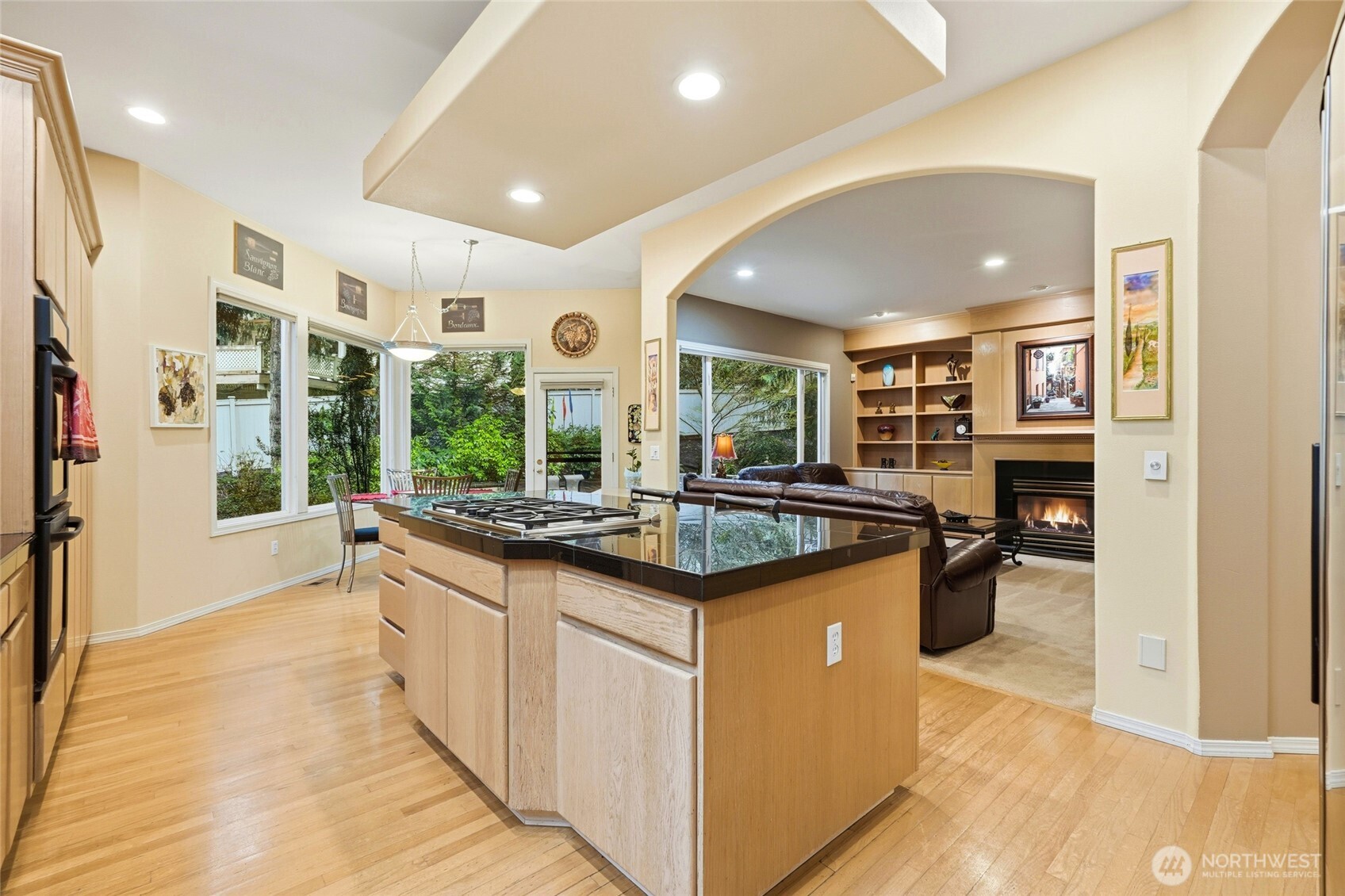 5633 194th Lane Southeast Issaquah, WA 98027 - Photo 17 of 40 a kitchen with stainless steel appliances granite countertop a stove and a sink