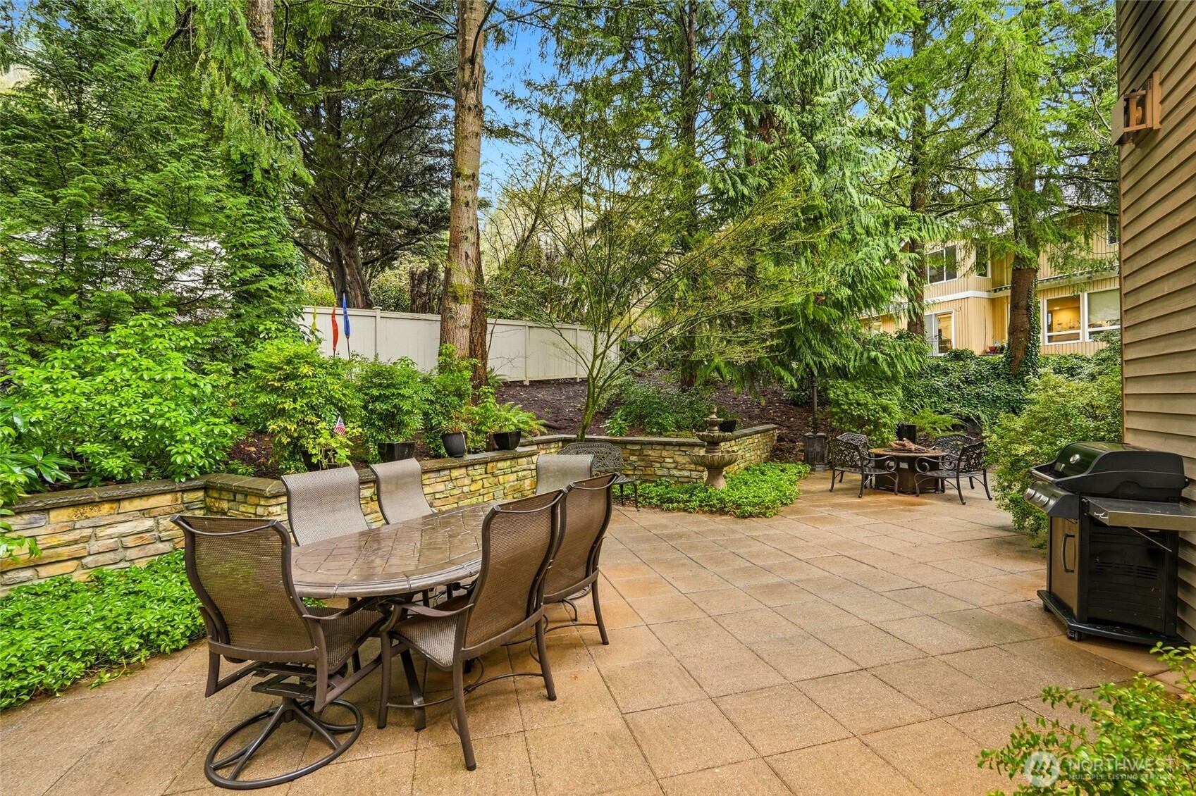 5633 194th Lane Southeast Issaquah, WA 98027 - Photo 18 of 40 a view of backyard with seating and green space