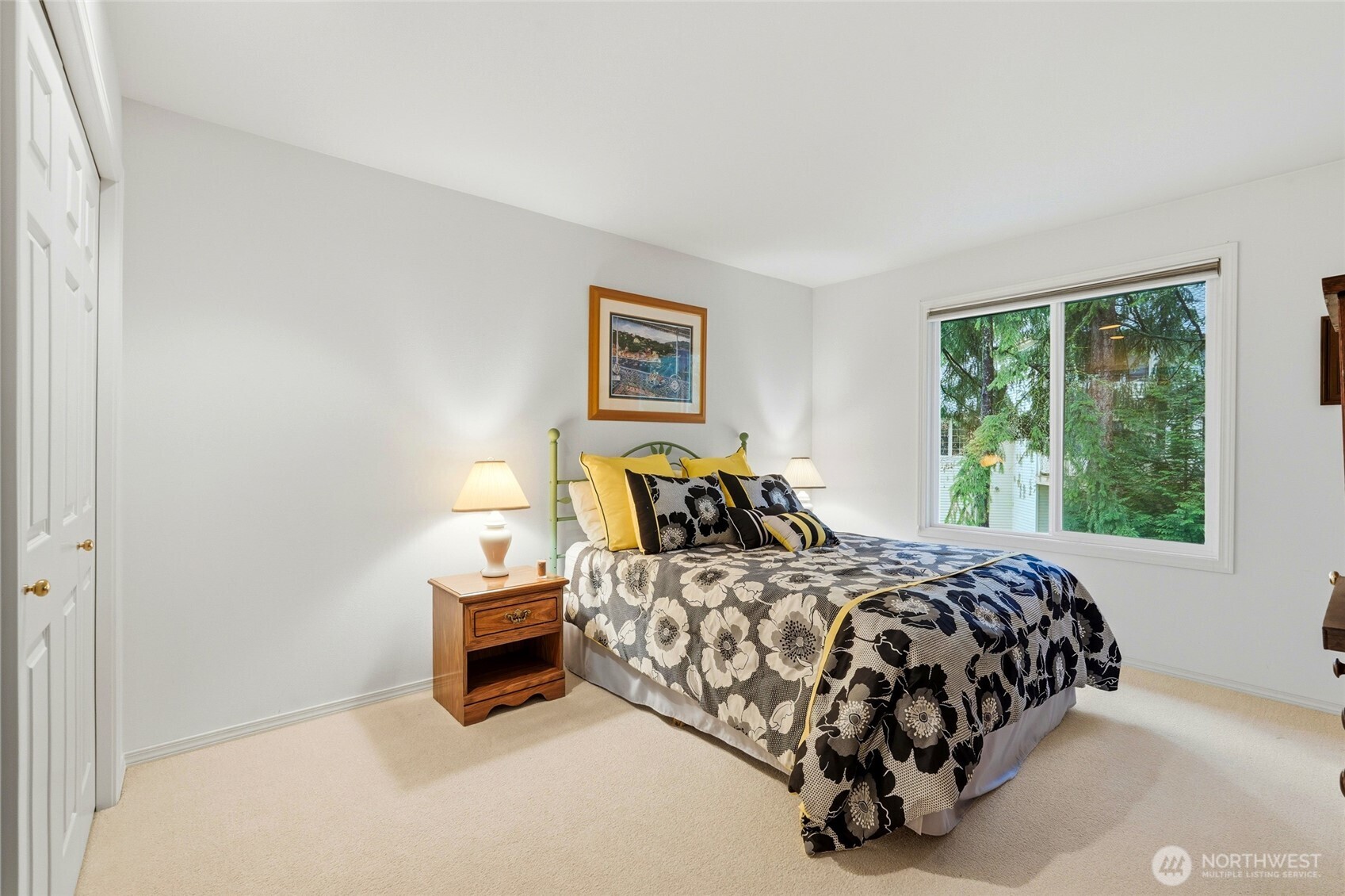 5633 194th Lane Southeast Issaquah, WA 98027 - Photo 28 of 40 a bedroom with a bed and a window