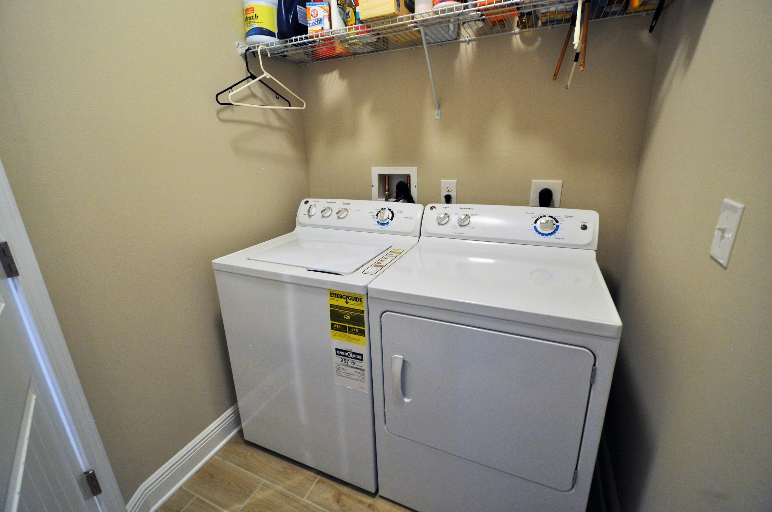 281 Pin Oak Loop Santa Rosa Beach, FL 32459 - Photo 17 of 21 a utility room with dryer and washer